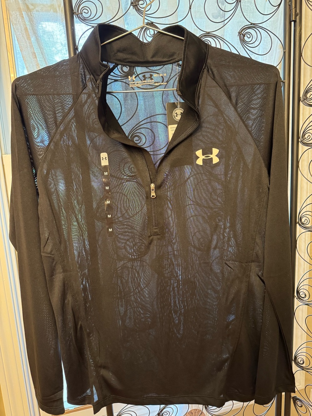 Under Armour Women's Heat gear pullover Medium